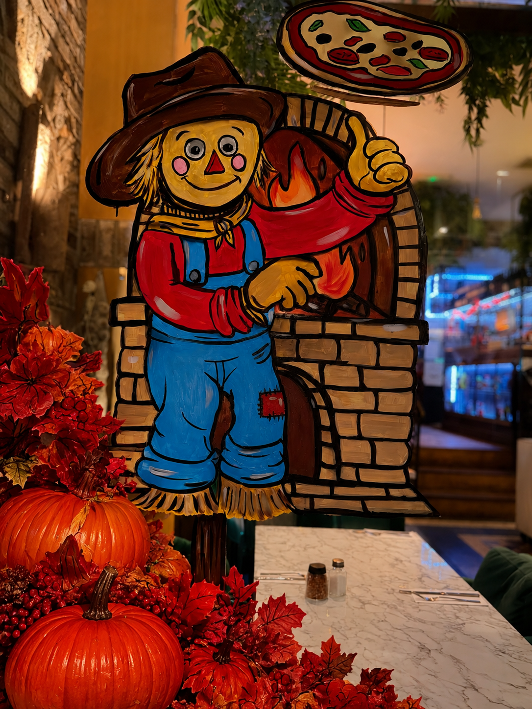 Hand-painted window mural — Pizza Scarecrow, ARCHWAY
